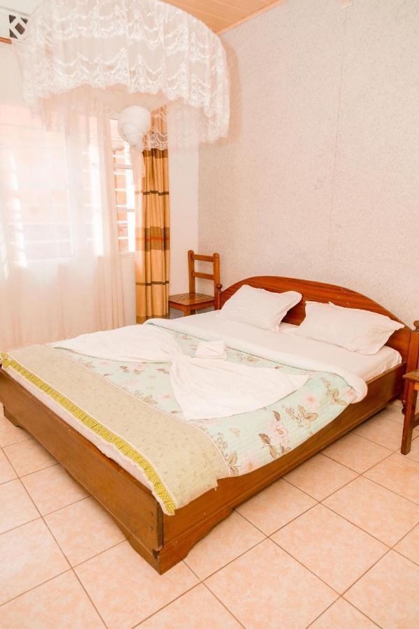 Auberge La Caverne Kigali Buitenkant foto